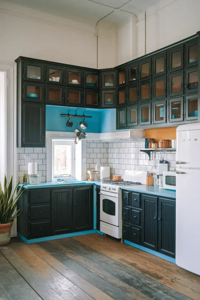 Add a Touch of Blue-Black Drama-black cabinet kitchen ideas