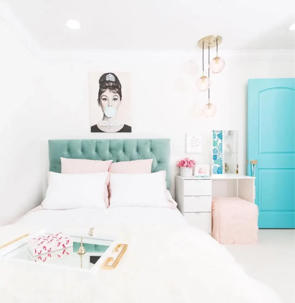 Preteen girls bedroom ideas with teal headboard, pink accents, modern vanity, and playful wall art.