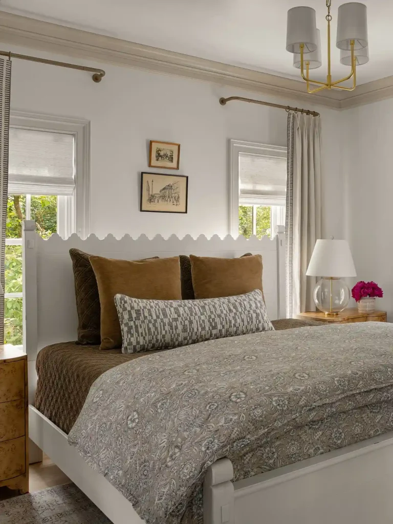 bedding in warm brown tones with patterned quilt and modern decor.
