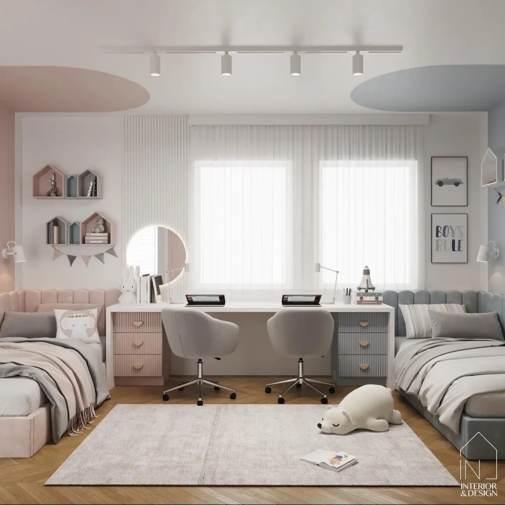 Boy and girl shared bedroom with twin beds, soft pastel walls, dual desks, and cozy seating.