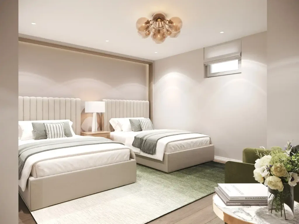 beige bedding, black iron bed, and cozy pillows.
