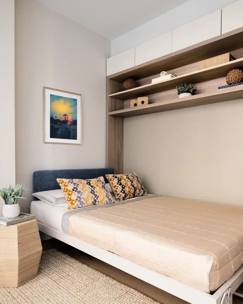 Guest bedroom with Murphy bed pulled down, transforming office into sleeping space.