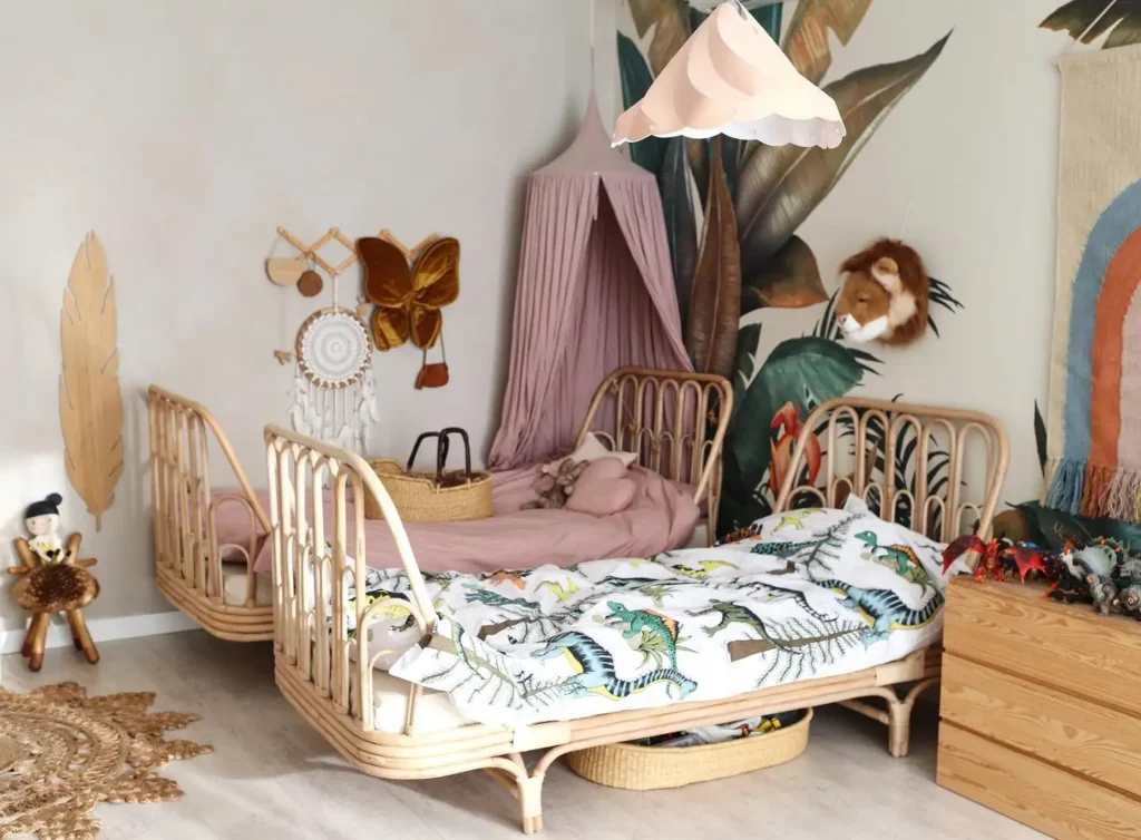  Boy and girl shared bedroom with Mickey and Minnie Mouse wall art and black, white, red décor.
