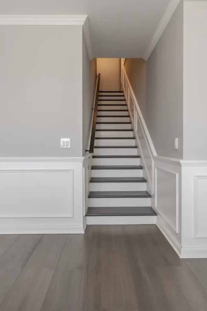 Modern Gray Flooring with Contrast Baseboards