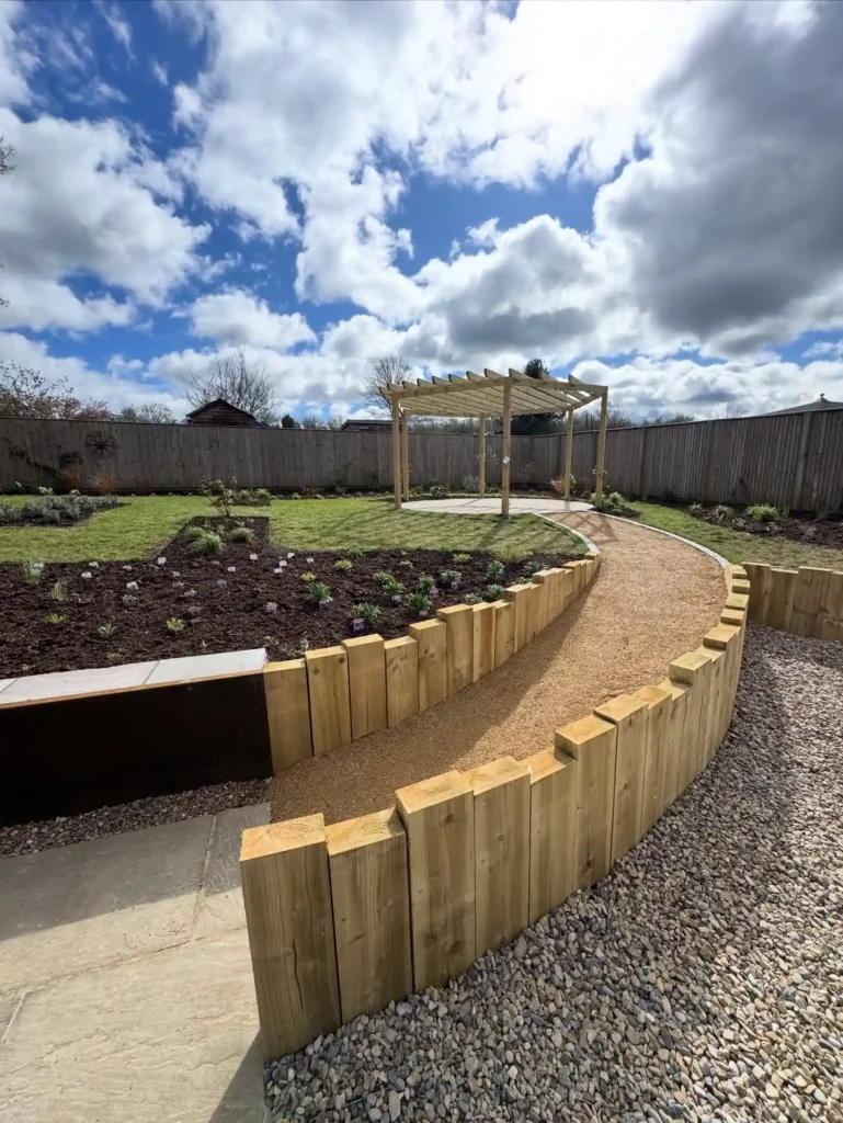 Curved Timber Retaining Wall with Defined Pathway