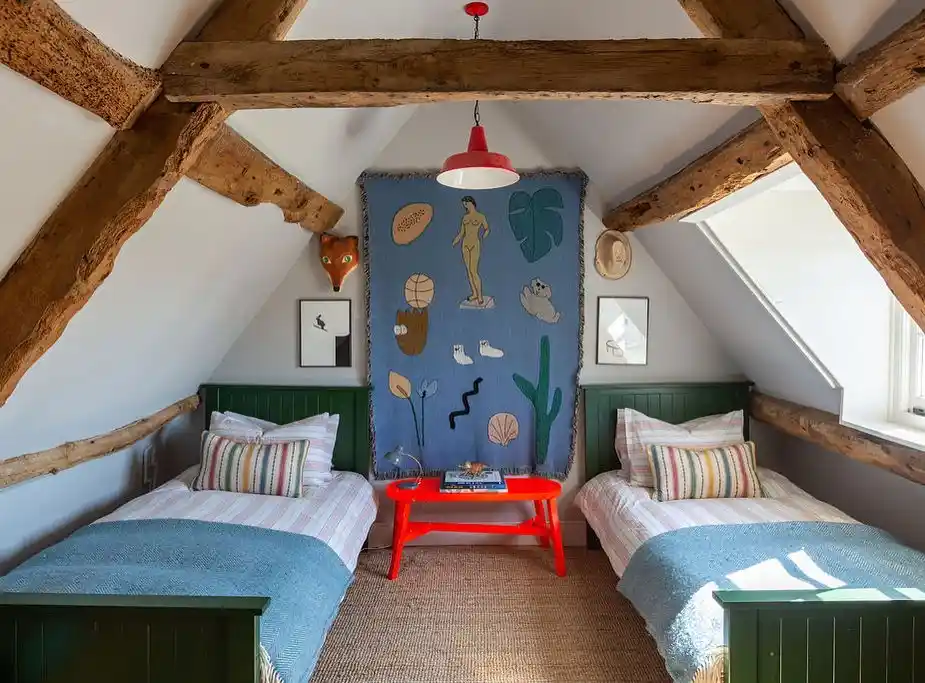 Symmetrical Twin Attic Bedroom with Rustic Beams