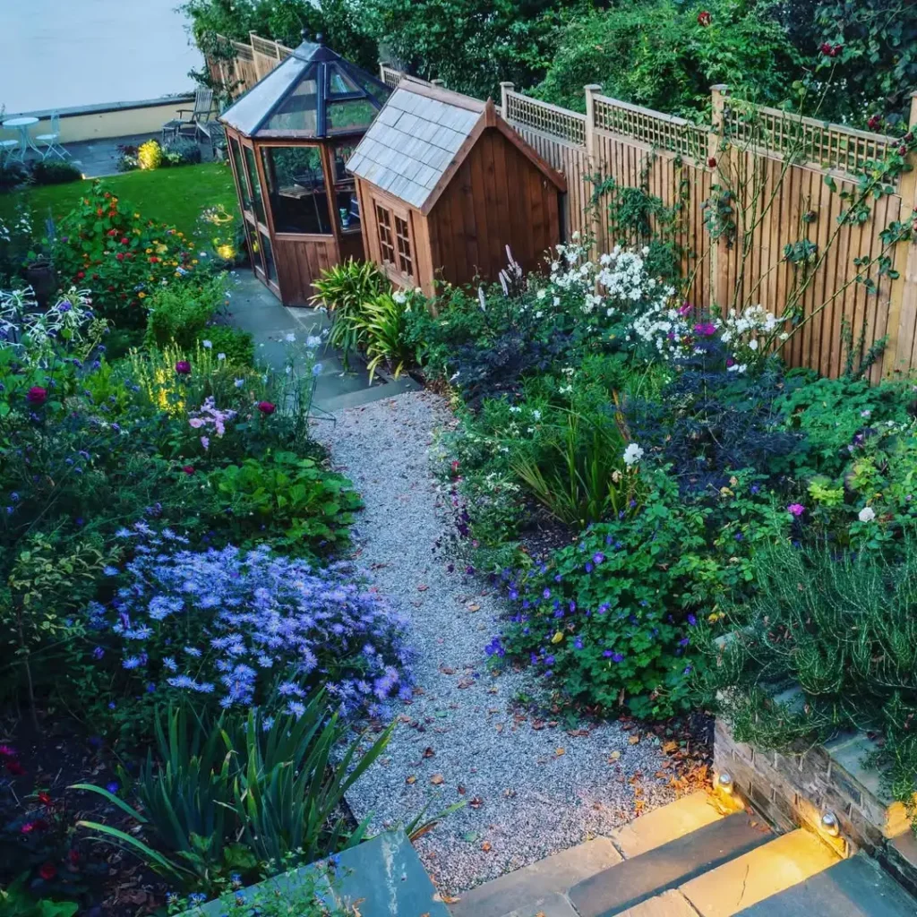 Lush Garden Retreat with Hidden Greenhouse Corner
