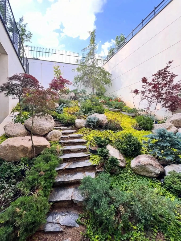 Natural Stone Pathway with Layered Greenery